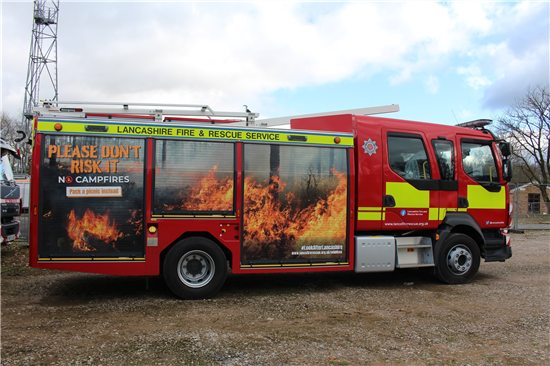 Fire engine with livery showing wildfires and associated risks