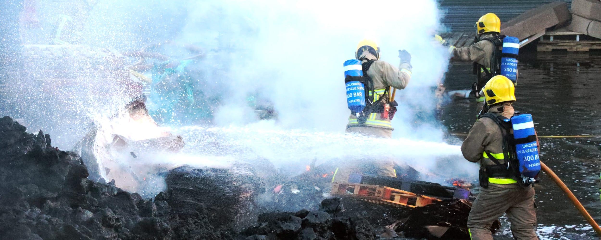 Firefighters extinguishing a fire