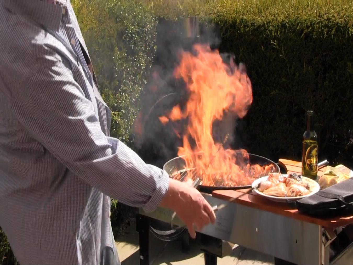 person using barbecue