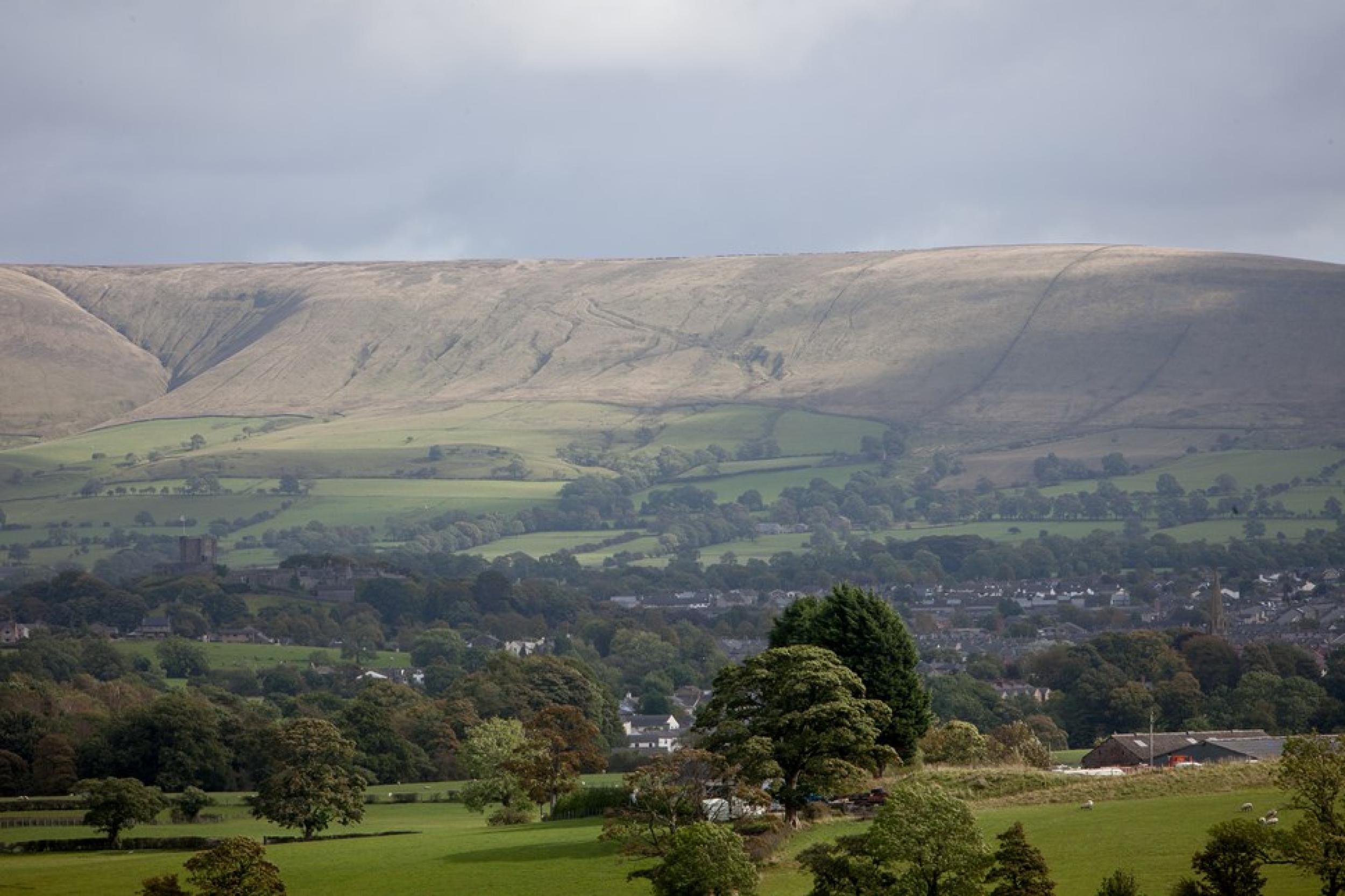 Image of a Lancashire town with hills in the distance